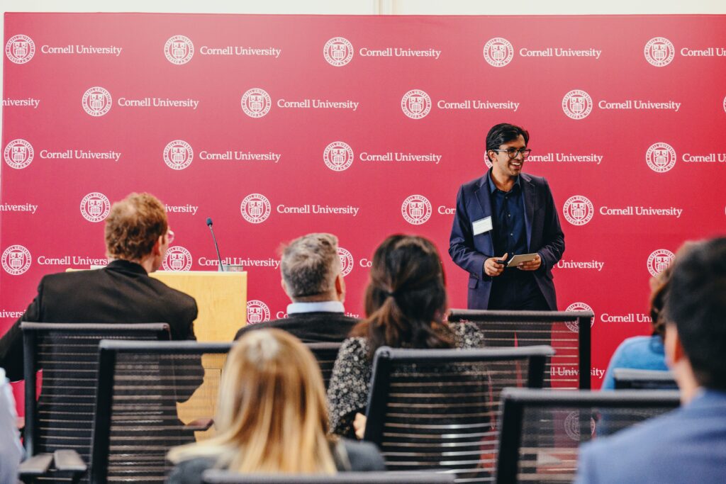 Anshul Krishnan '23 speaks to a crowd.
