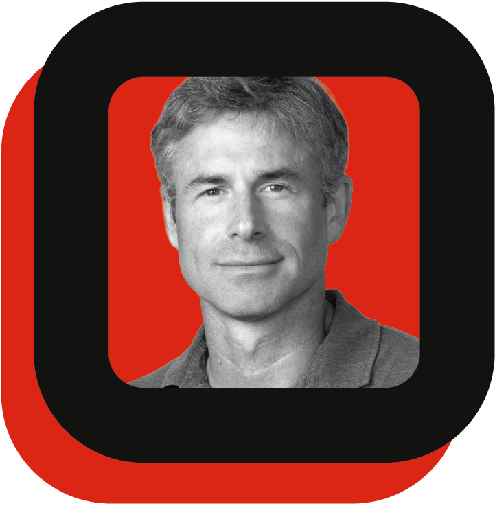 black and white photo of a man in a red and black square frame.