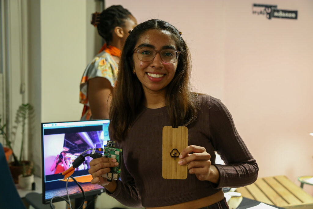 Photo: Asma Ansari holding a prototype of her product, Orgophone