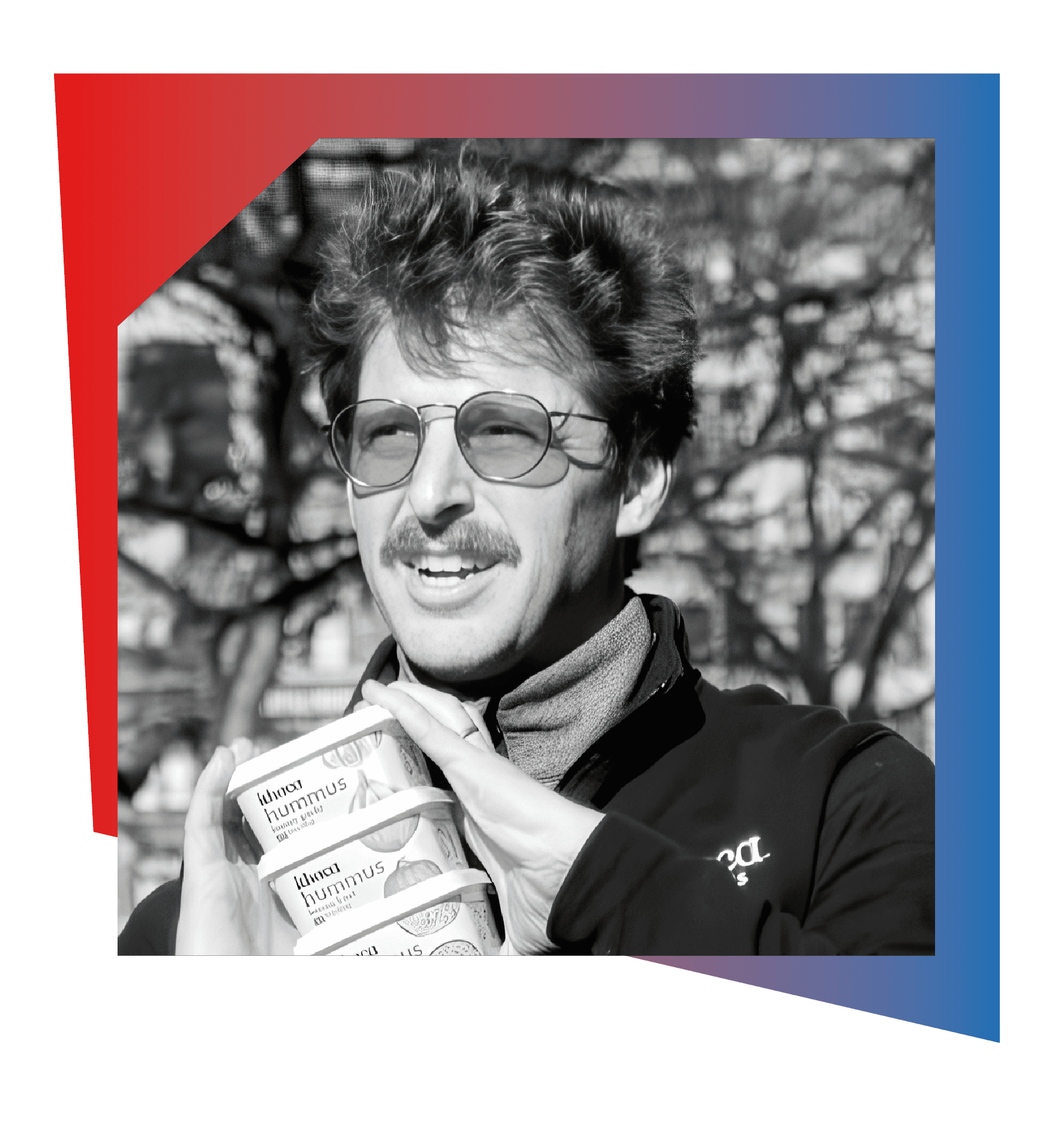 Chris Kirby iron photo black and white image of a man wearing glasses holding plastic containers with a red and blue themed frame