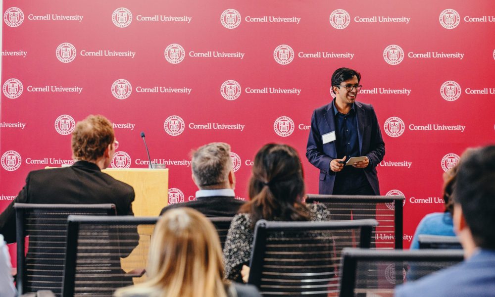 Anshul Krishnan '23 speaks to a crowd.