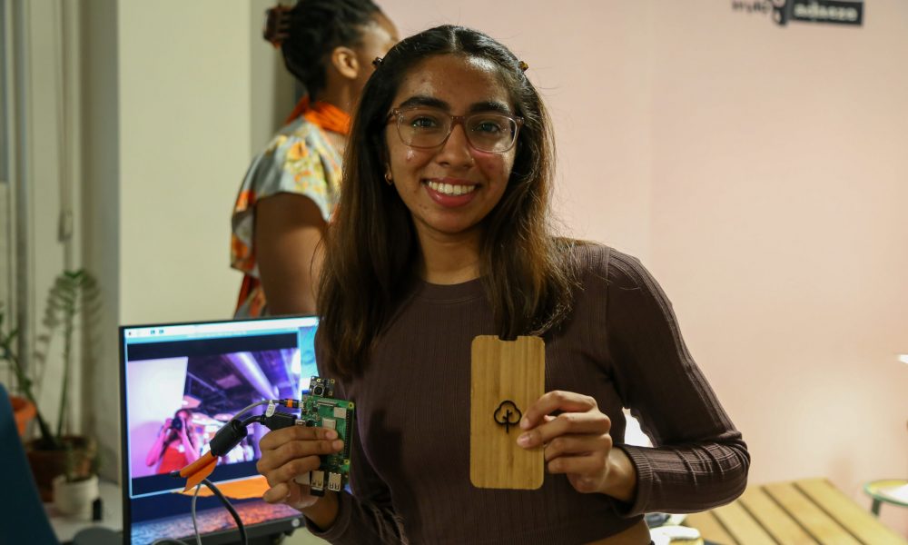 Photo: Asma Ansari holding a prototype of her product, Orgophone