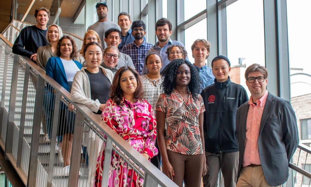 Photo: The 2023 Green Technology Innovation Fellowship cohort poses on the stairs of Breazzano Center.