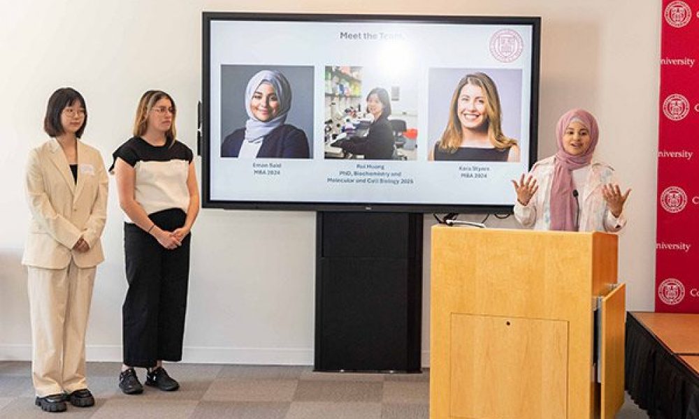 Rui Huang, PhD ’25 , Kara Styers, MBA ’24, and Eman Said, MBA ’24, begin their pitch at the Life Sciences Technology Innovation Fellowship showcase.