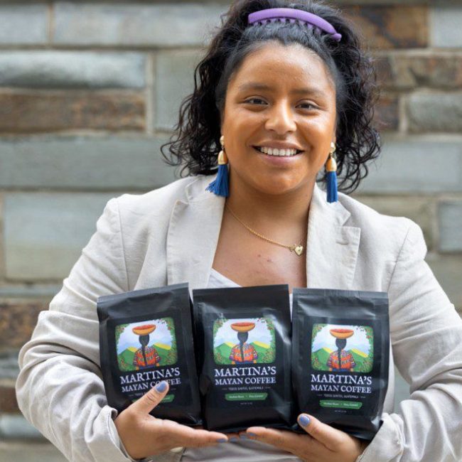 Hospitality student markets coffee from her rural Guatemalan village