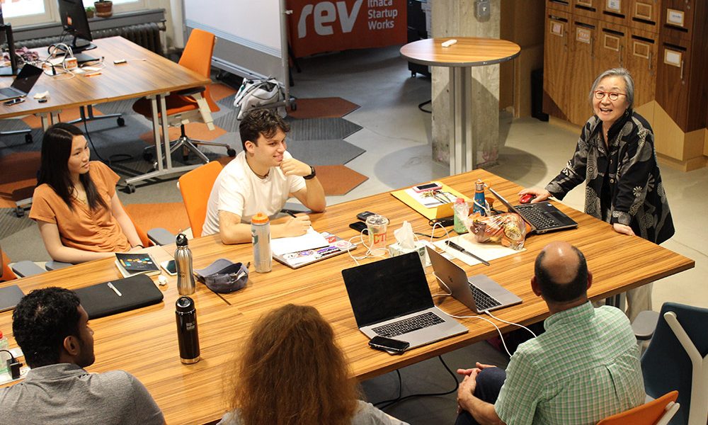 people talking around a table