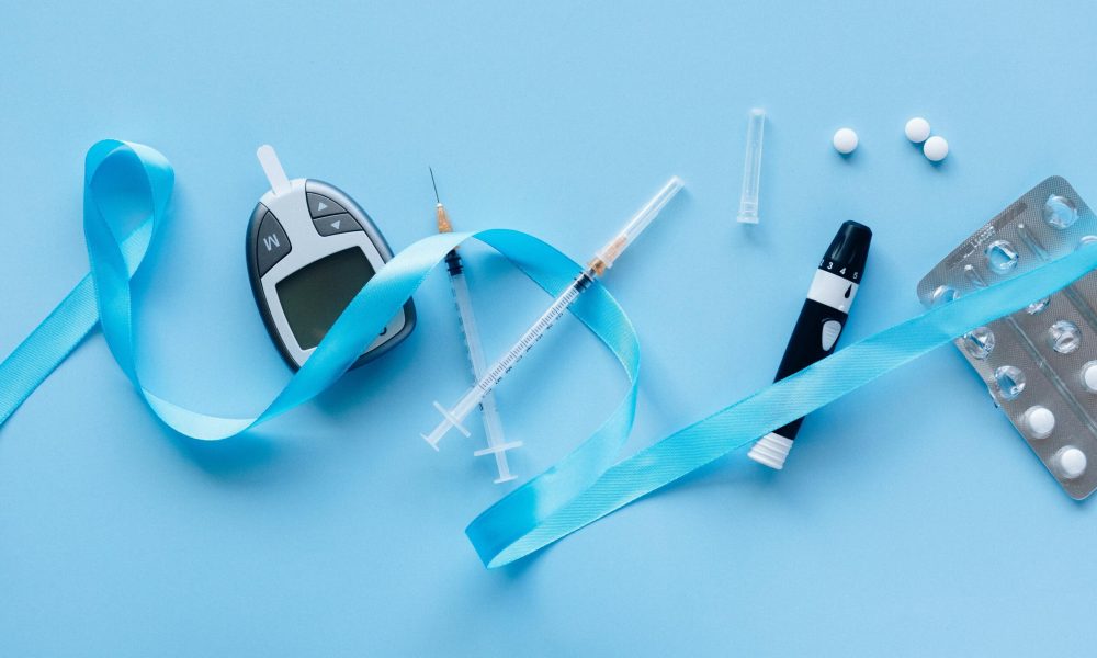 diabetes medication and blue ribbon