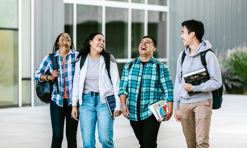 group of people walking and laughing