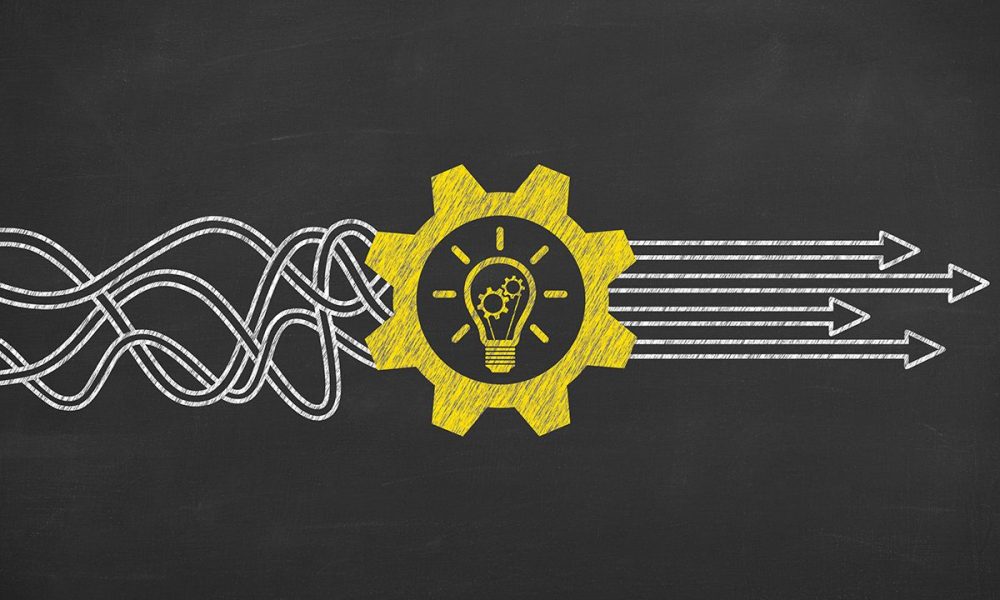 squiggly lines and a yellow gear drawing on a black background