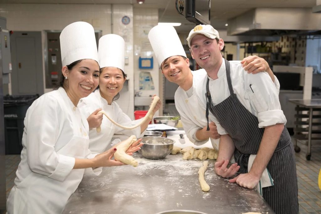 culinary students in the kitchen