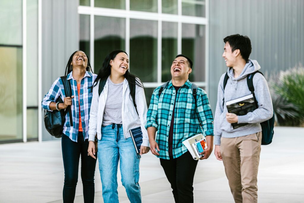 group of people walking and laughing
