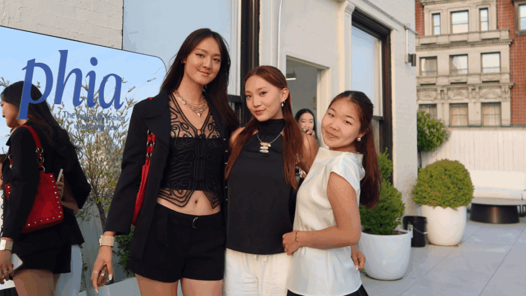 three girls standing together hugging